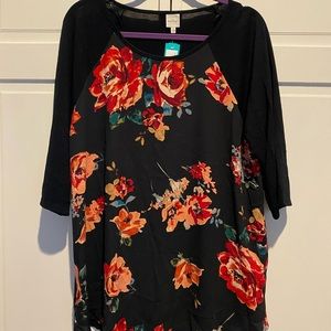 Floral top with cute baseball style sleeves
